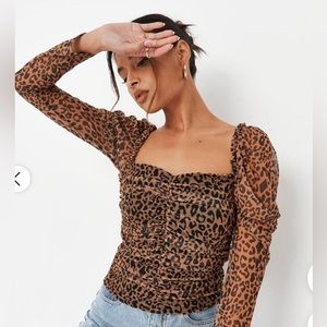 Misguided leopard top